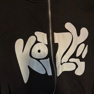 Black KOZY Zip Up Sweater with Cozy Knit and Versatile Style